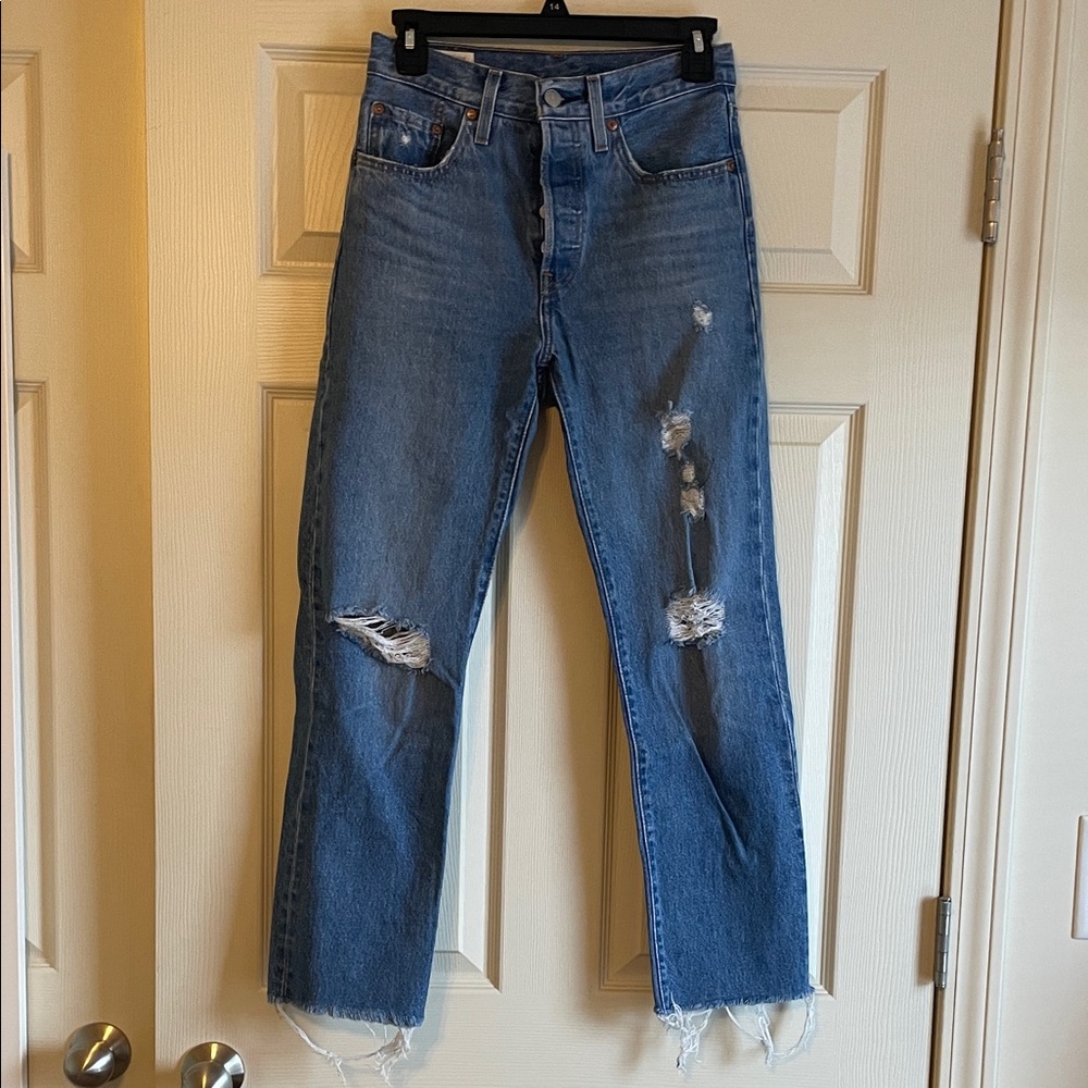 Levi’s premium 501 distressed medium wash straight leg jeans